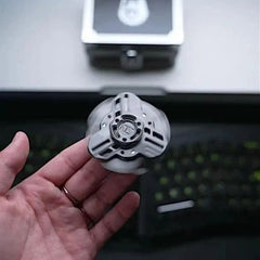 Tri linkage spinner