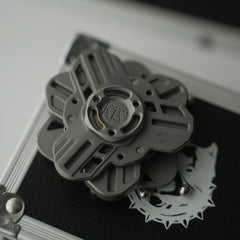 Tri linkage spinner