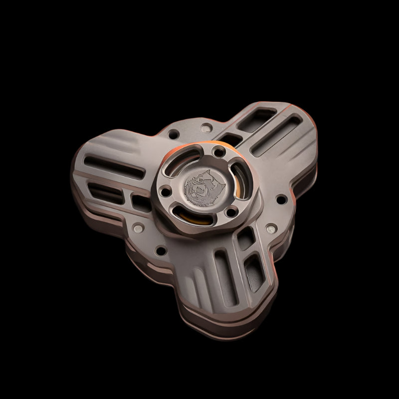 Tri linkage spinner